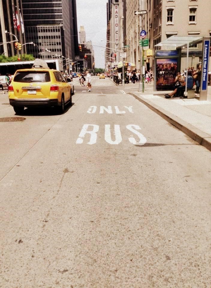 Bus lanes can only be shared by bicycles during evenings and weekends in NYC.
